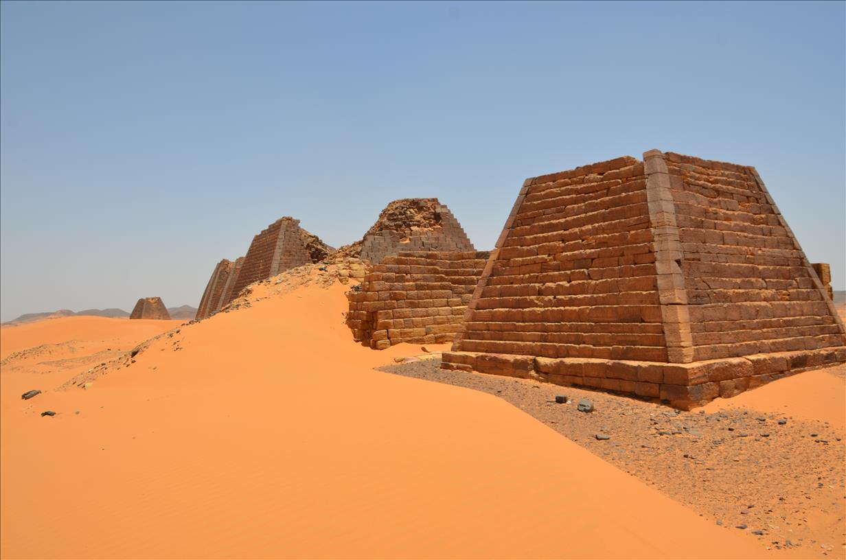 Sudan' s ' neglected' pyramids hazard being covered by moving sand ridges.